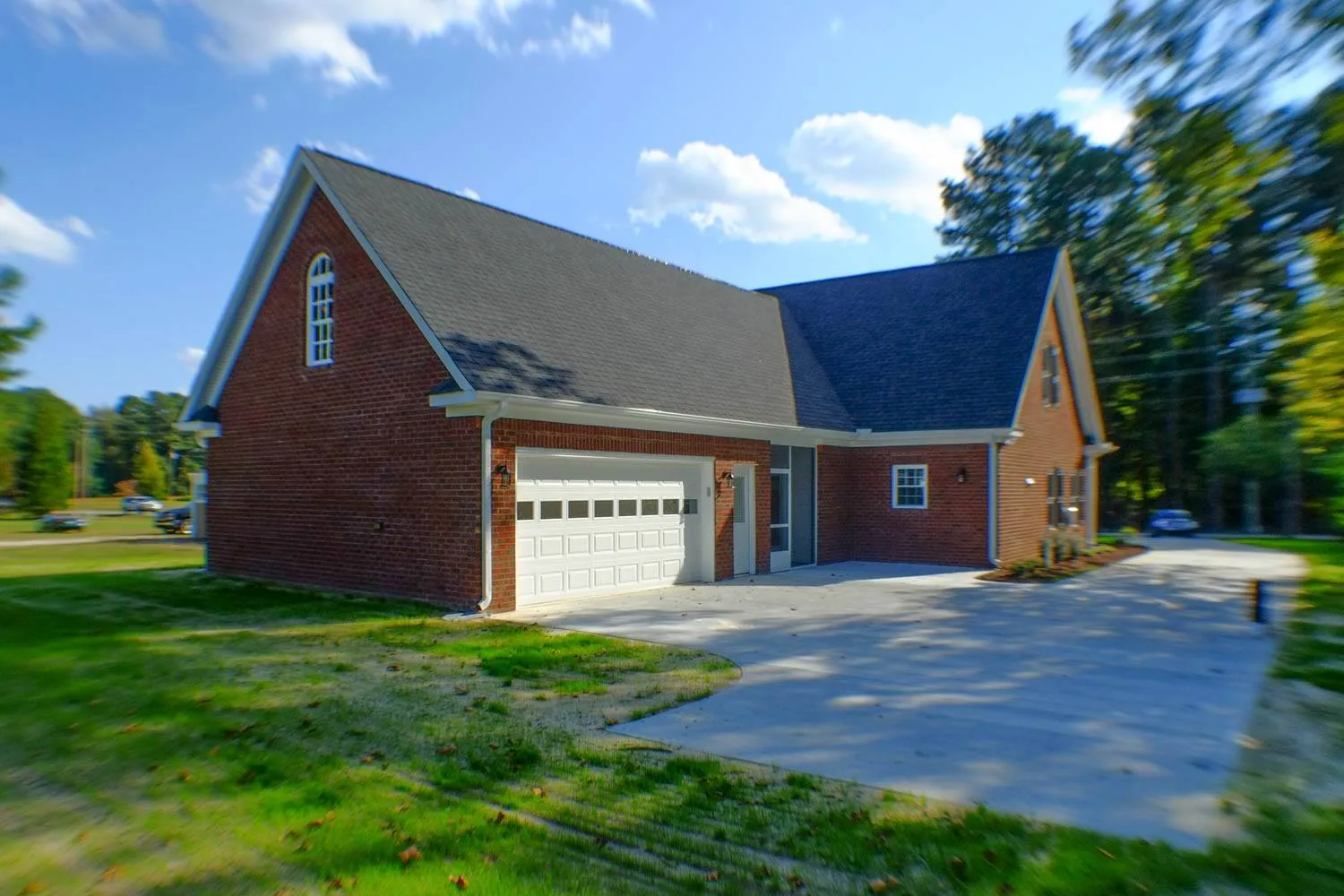Brick custom home with attached garage